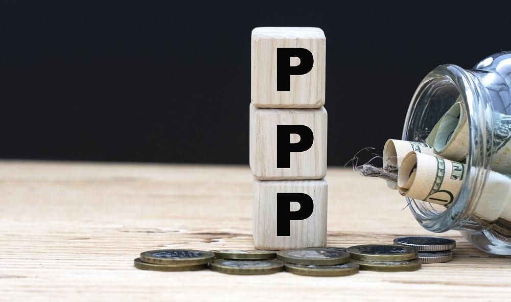 PPP on cubes on the background of a capacity with money