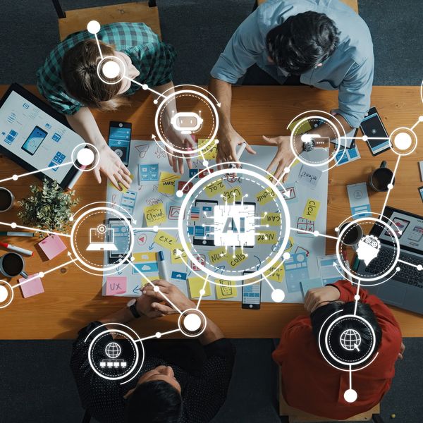 A business development team using AI