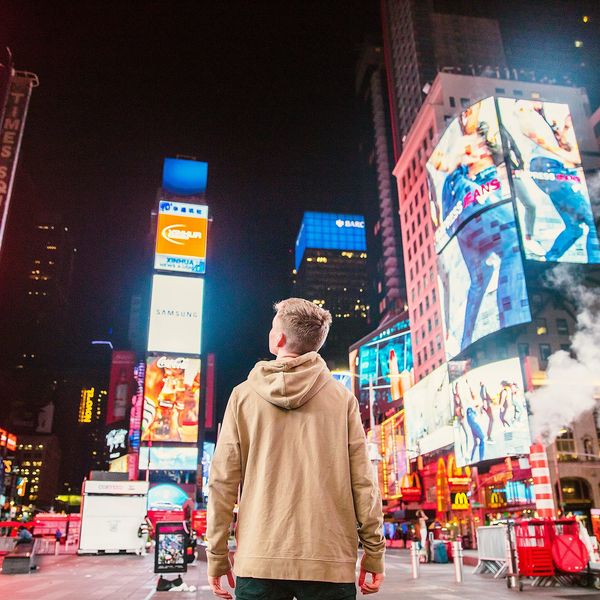A man looking at famous ad campaigns