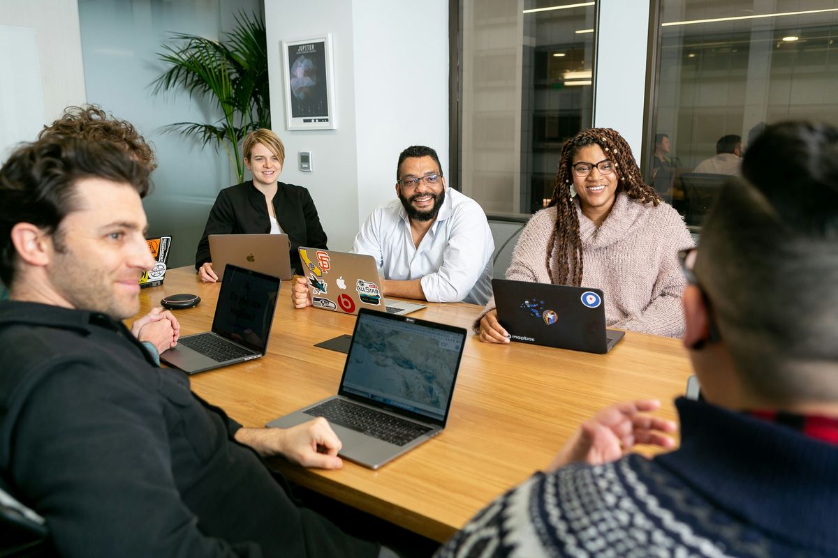A team demonstrating emotional intelligence during a meeting