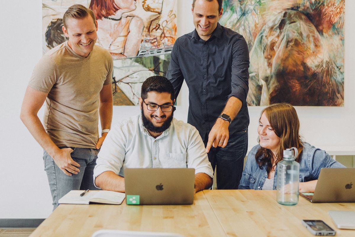 A team of motivated, engaged employees working together