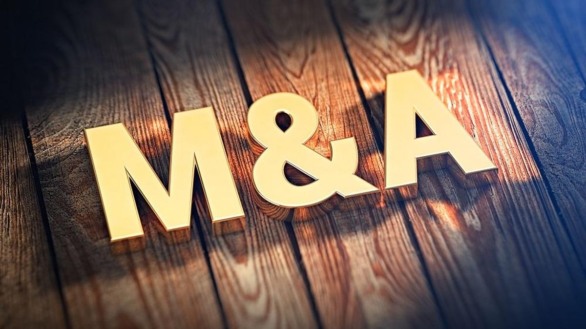 Acronym M&A on wood planks