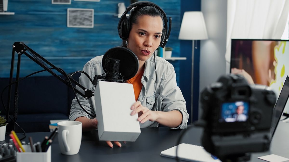 An influencer promoting a product in a video