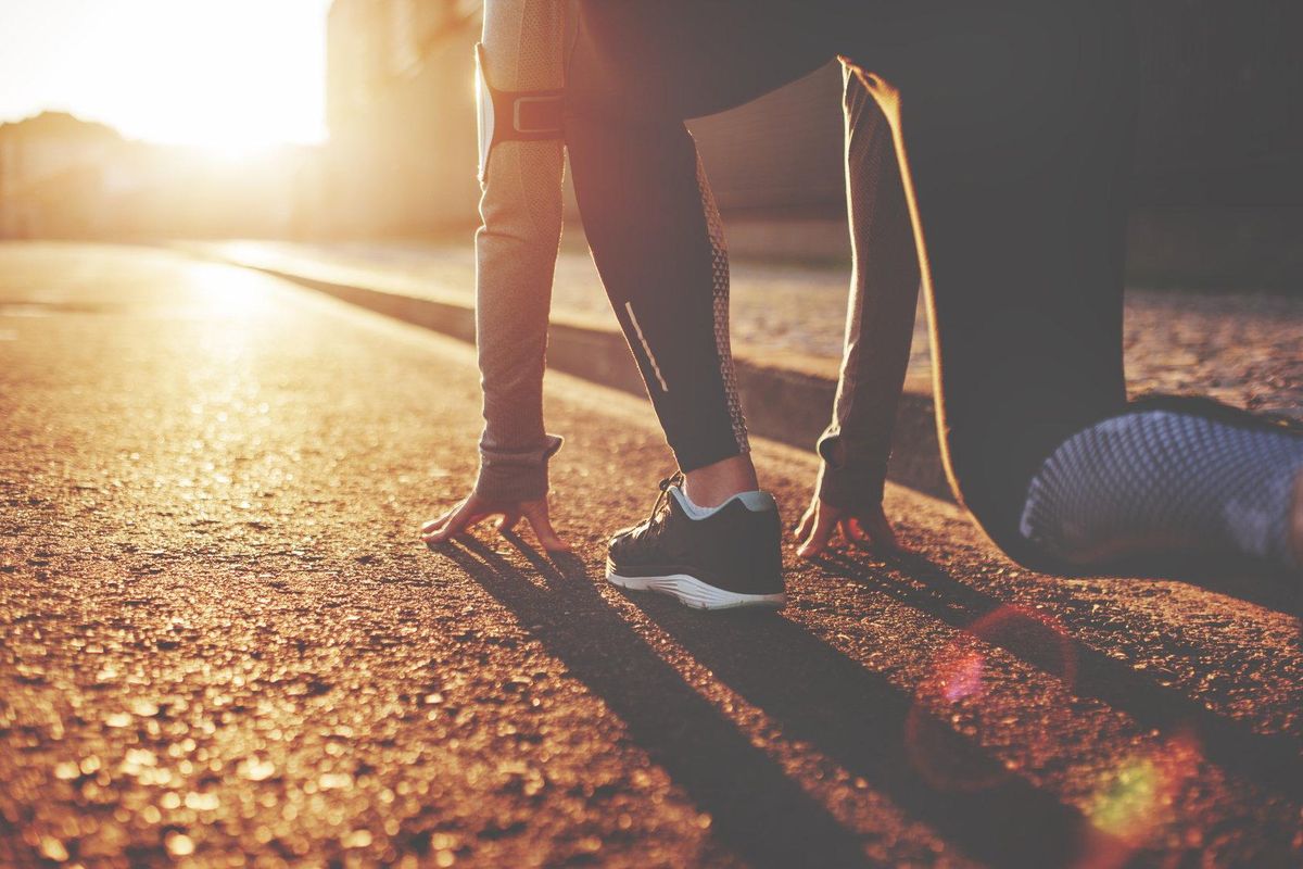 Athlete woman in running start