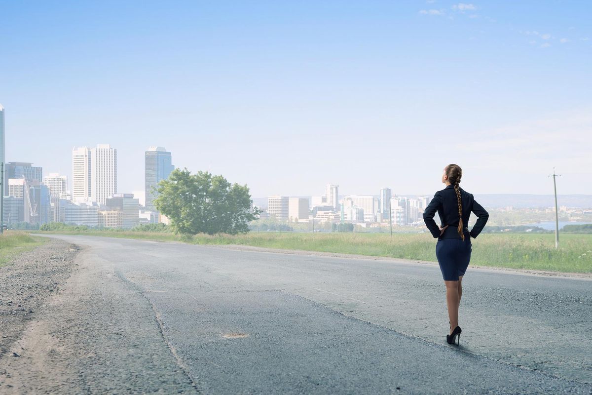 Back view of confident businesswoman