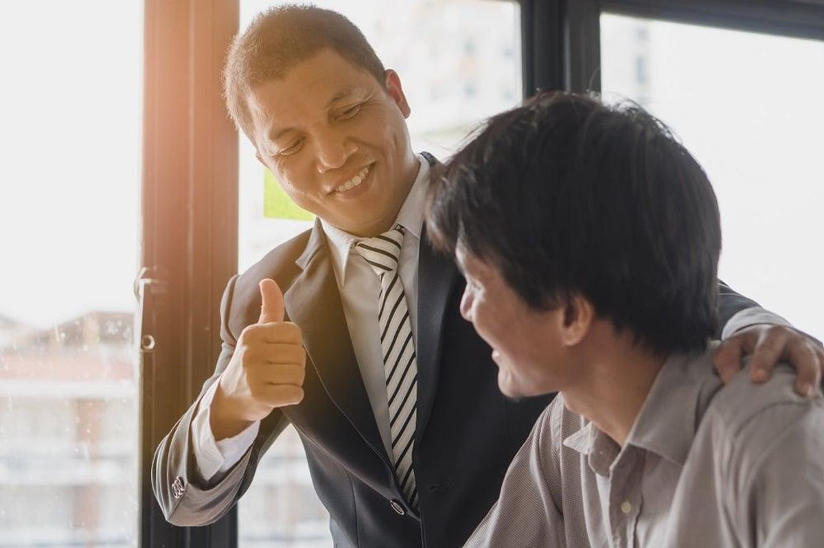 boss encourages employee