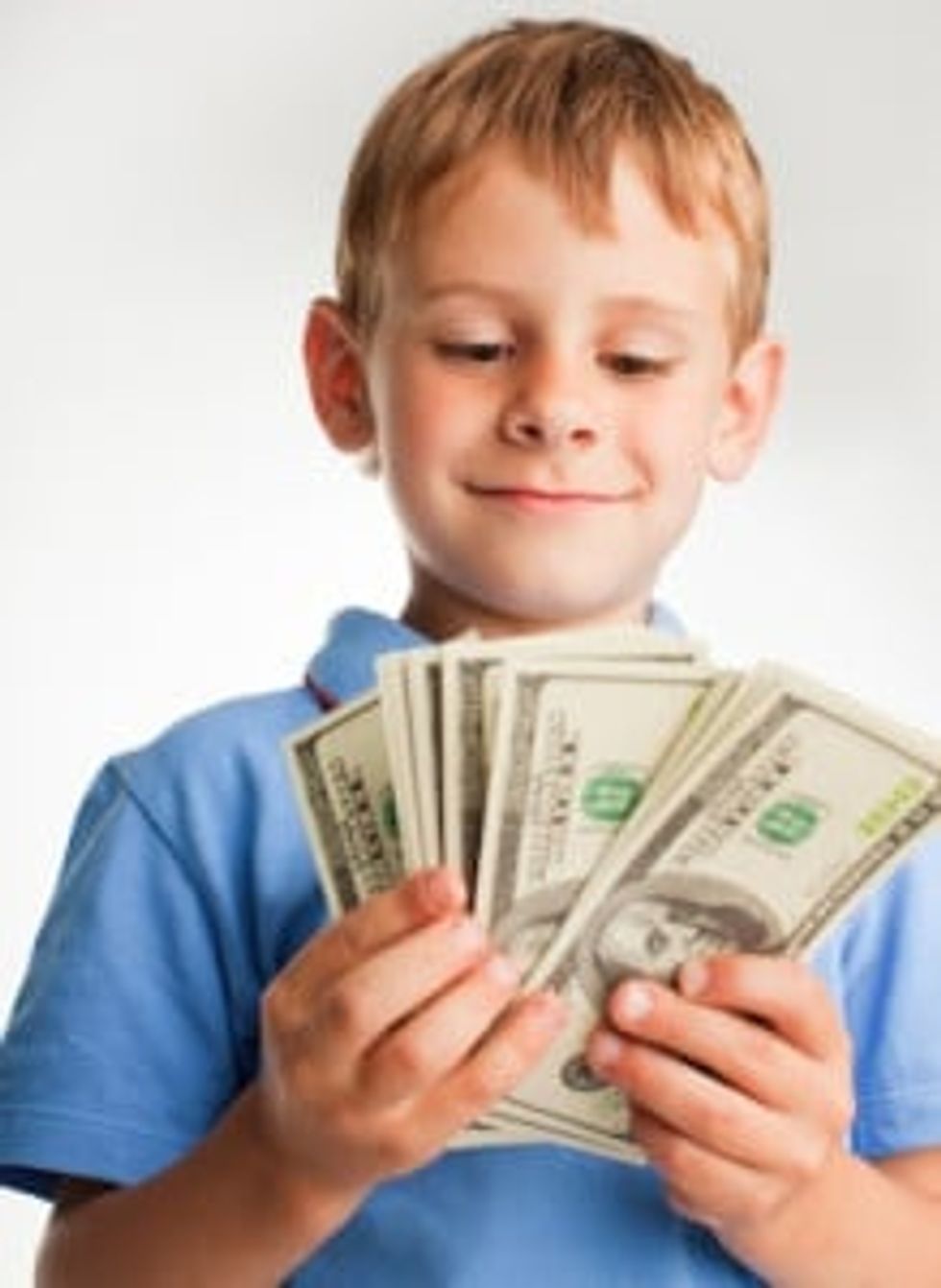 boy holding cash
