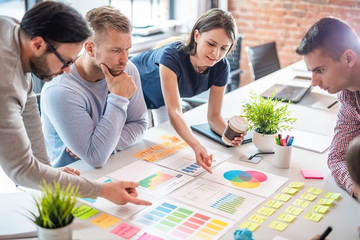 Brainstorming to put together a business model canvas