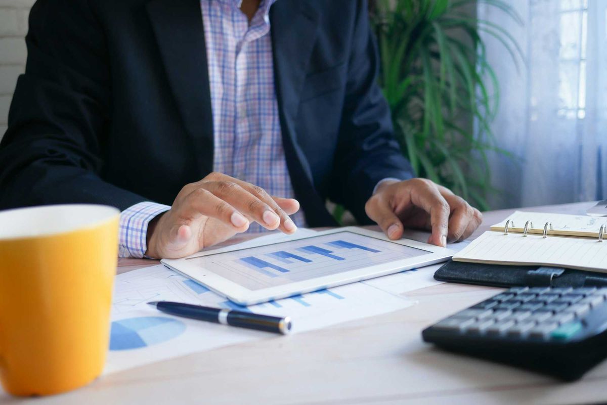 Business owner calculating estimated taxes on salary