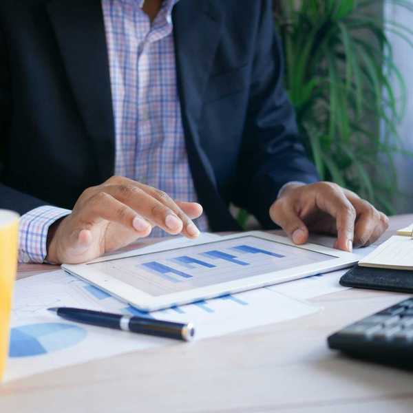 Business owner calculating estimated taxes on salary