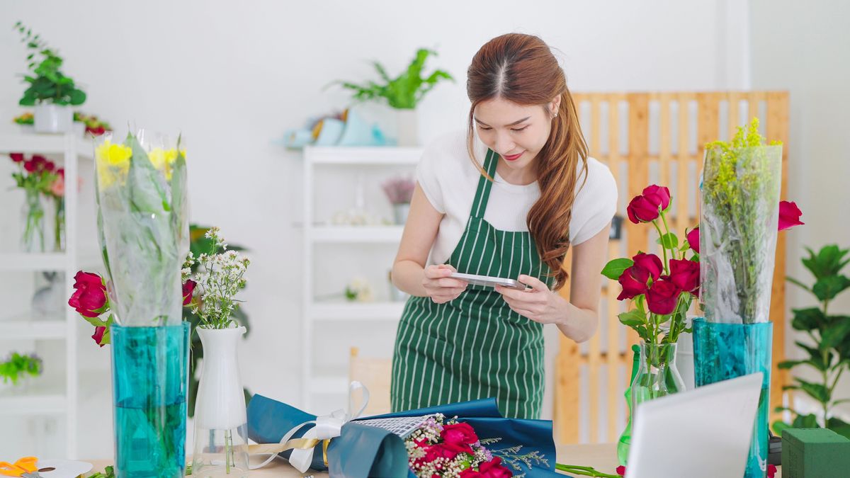 Business owner making behind the scenes social media content