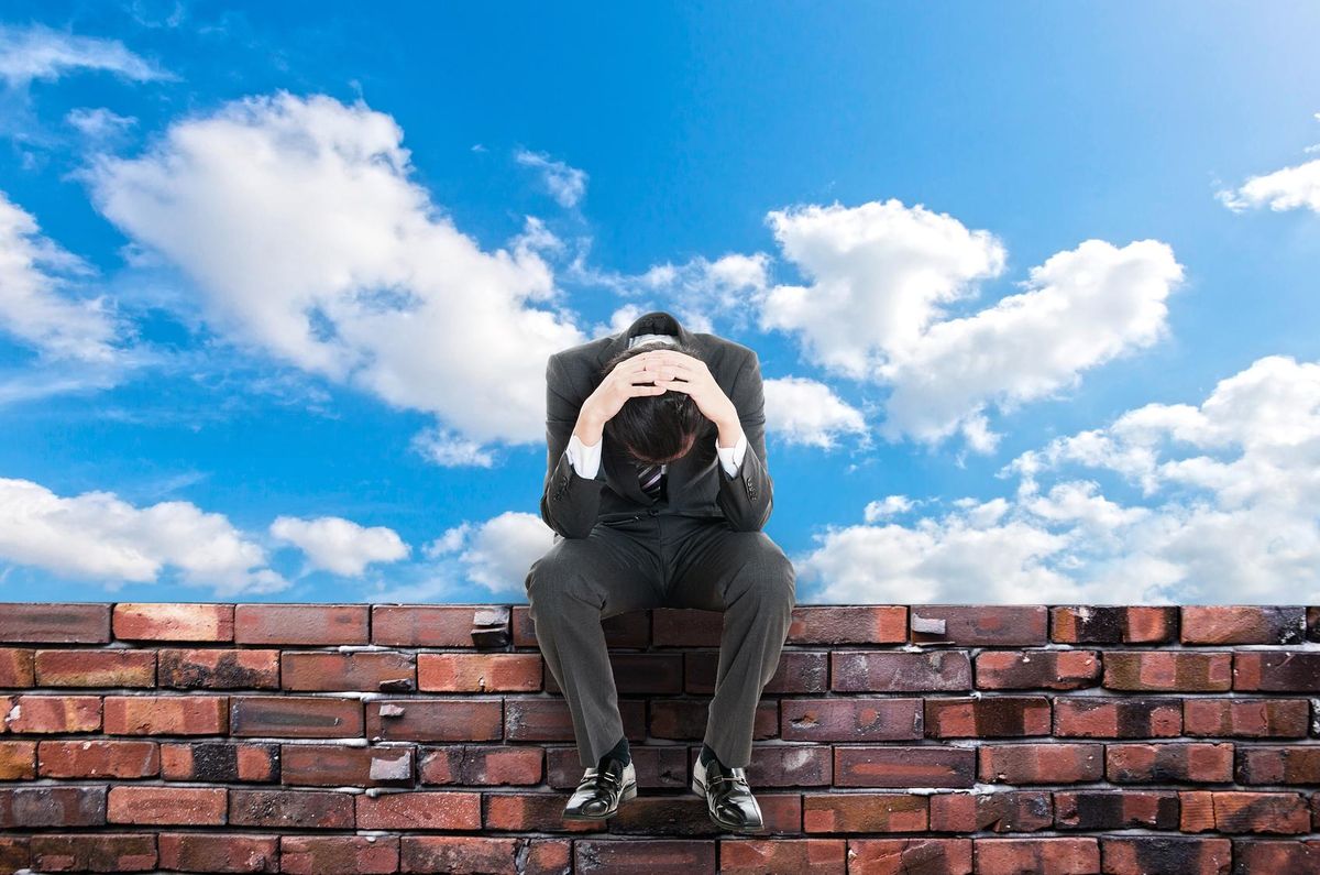 Business owner regretting marketing mistake