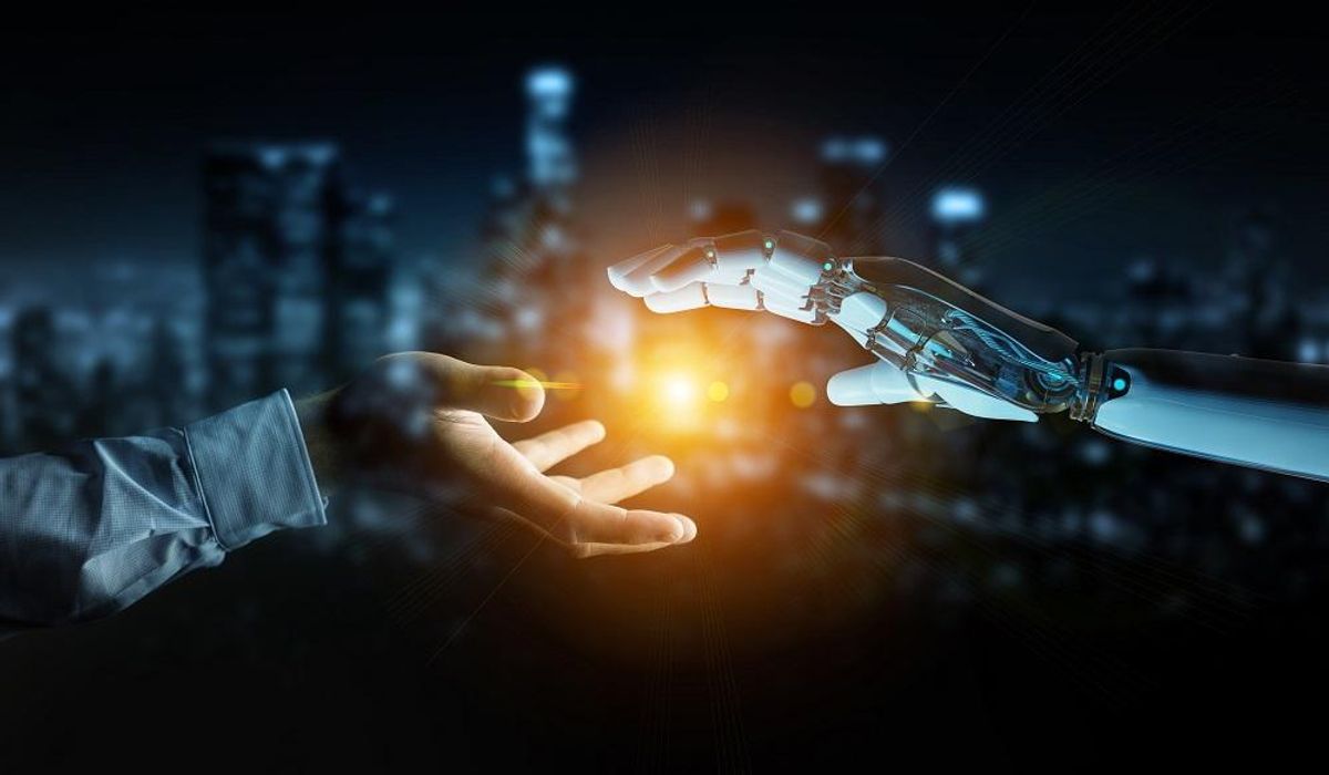 Business owner using robot to automate his business
