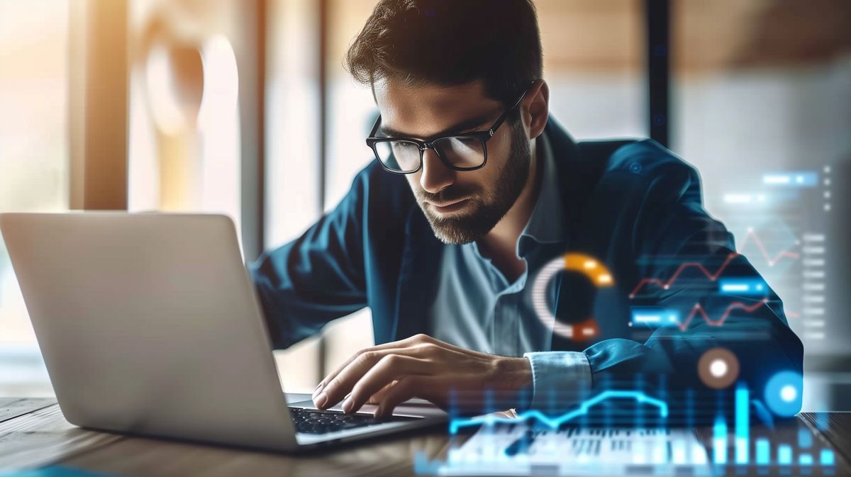 Business owner using sales analytics tools to boost sales numbers