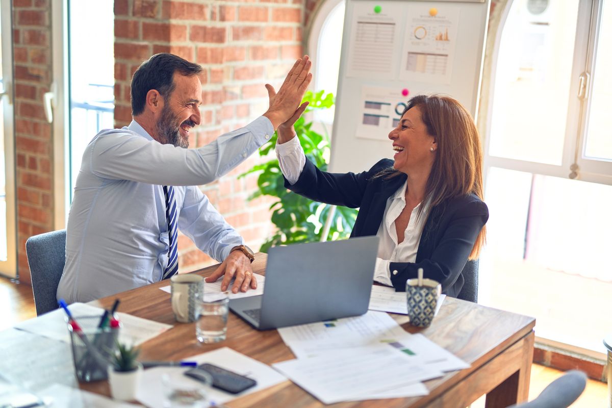 Business people excited scaling their small business