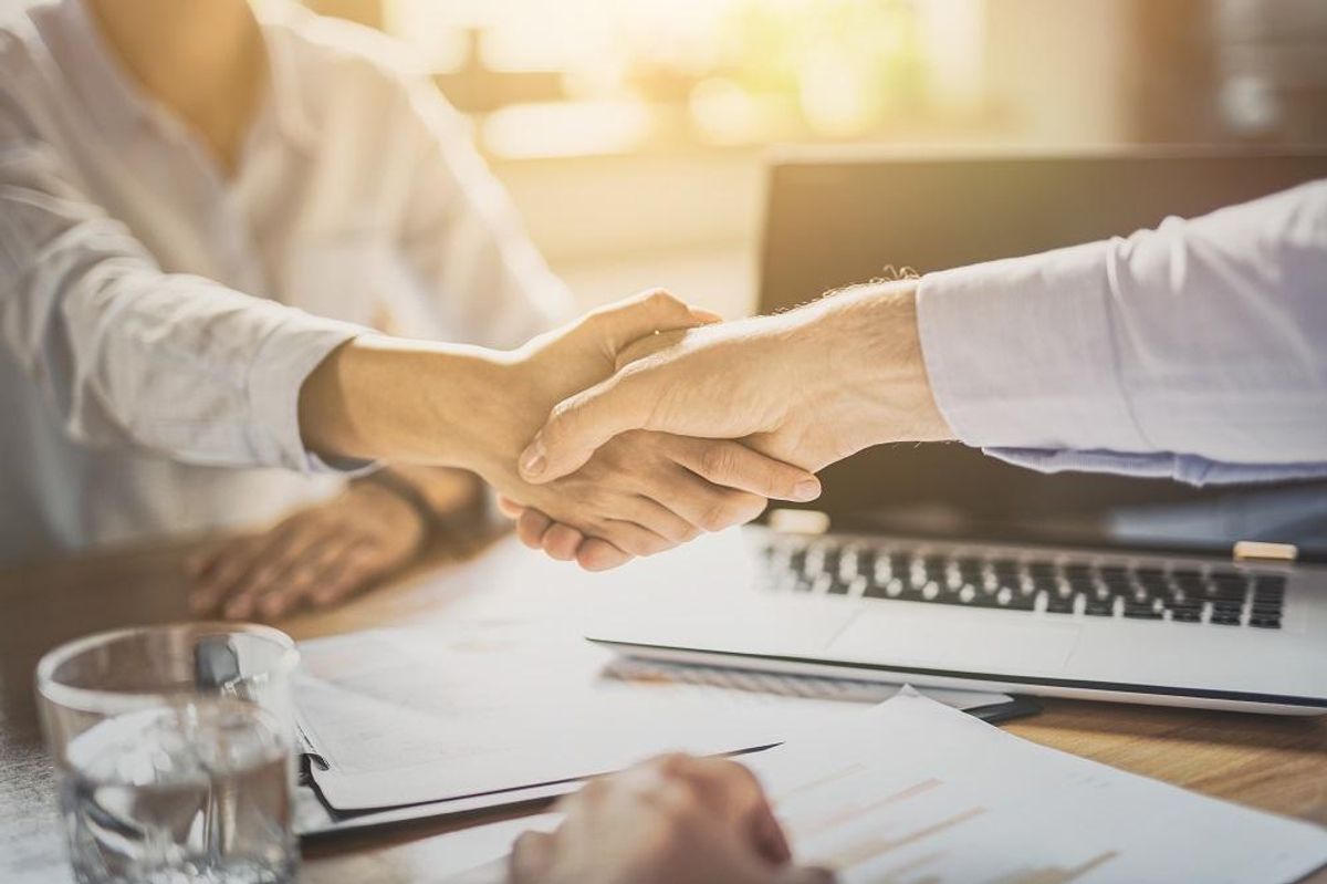 Business people shaking hands