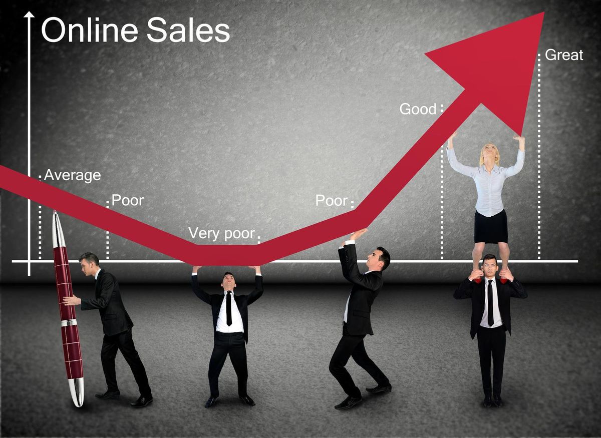 Business team push online sales arrow up