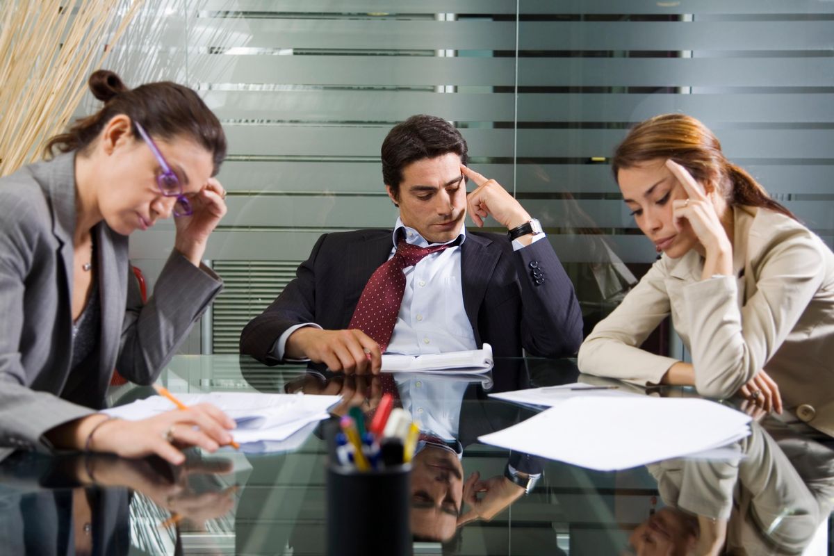 Business team with the post-holiday blues