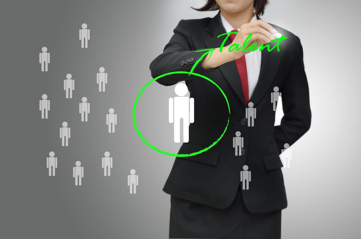 Business woman hiring rock-star employees