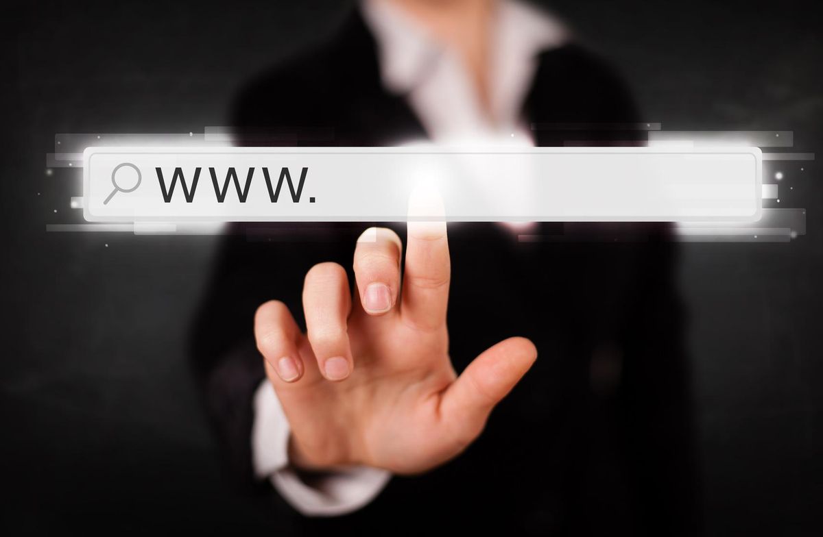 Business woman touching web browser address bar