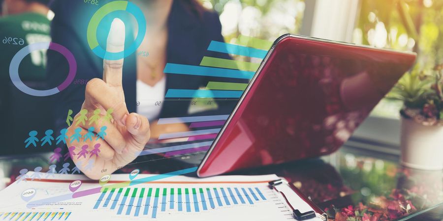 Business women looking at the marketing research to find out whether to diversify