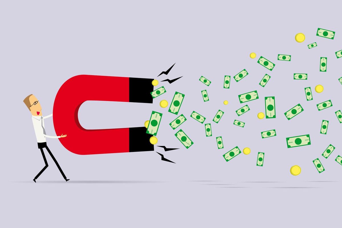 businessman attracting money