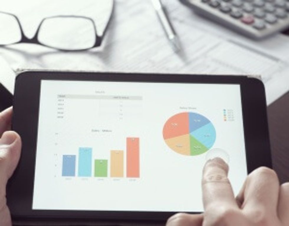 Businessman checking statistics