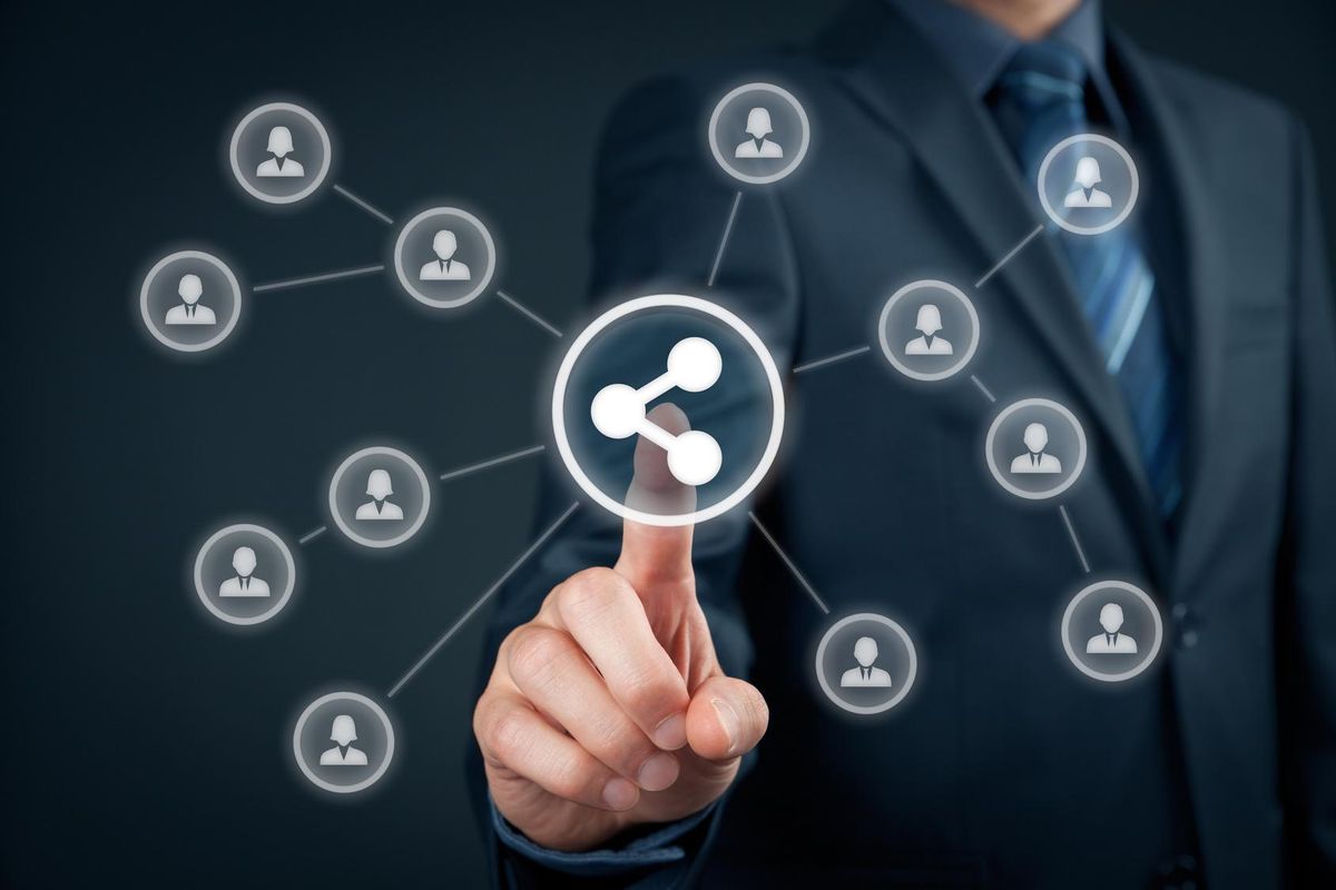 Businessman click on share button