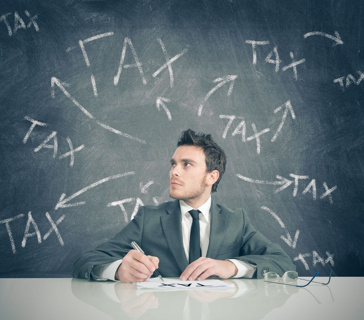 Businessman considering small business taxes for an LLC