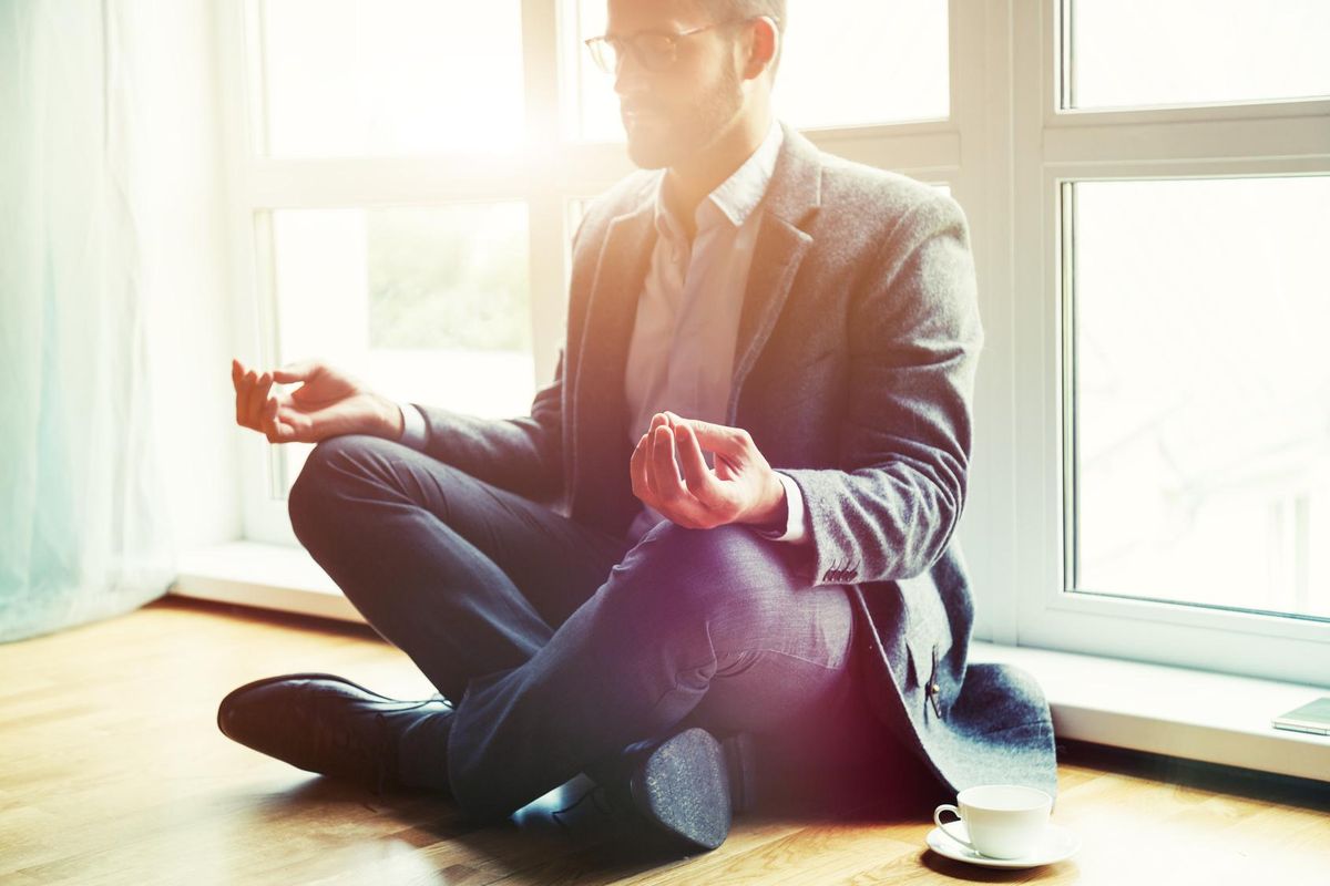 businessman doing yoga