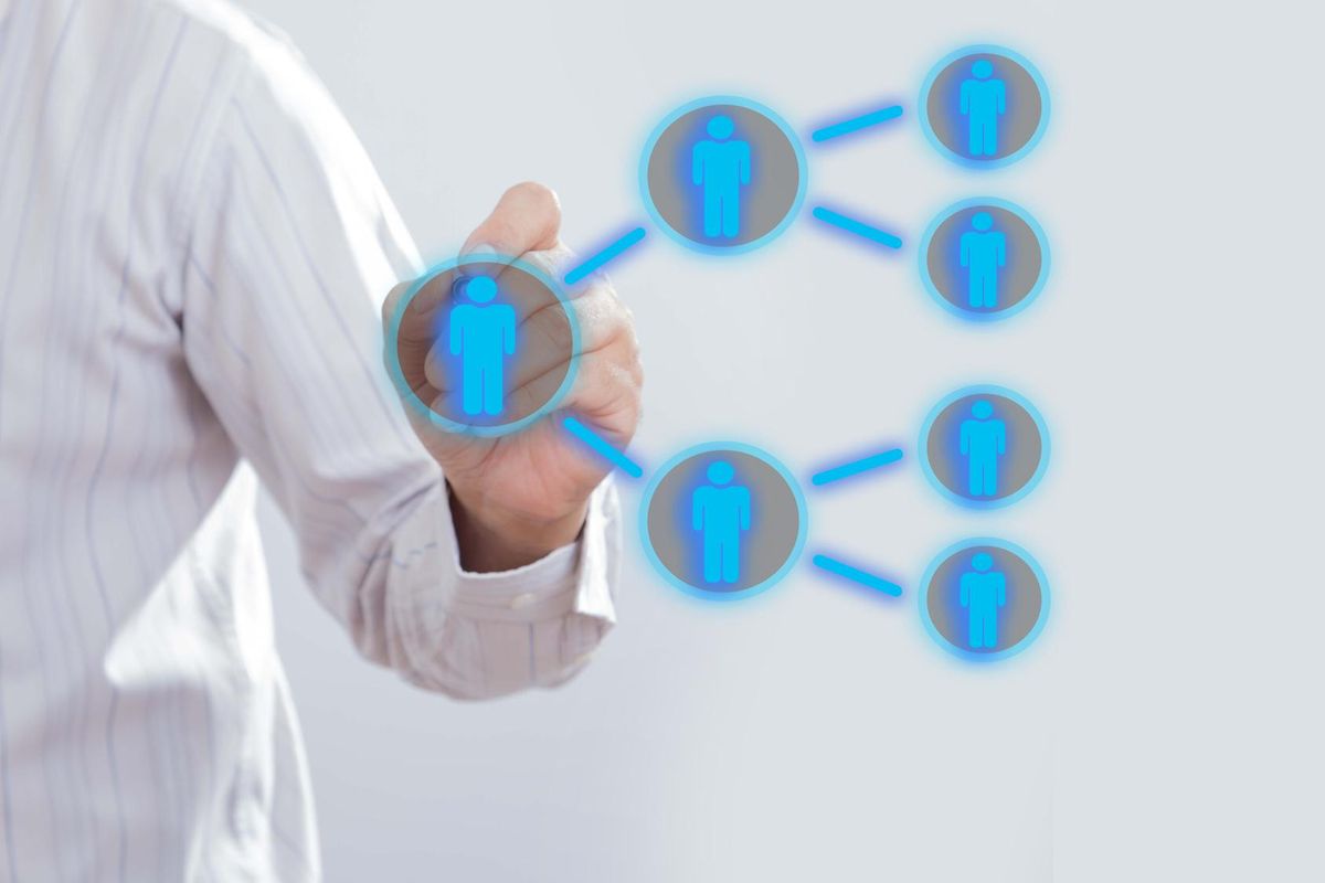 Businessman drawing Referral system concept.