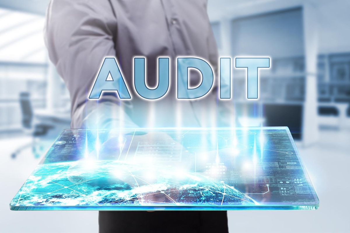 Businessman holding a tablet for audit