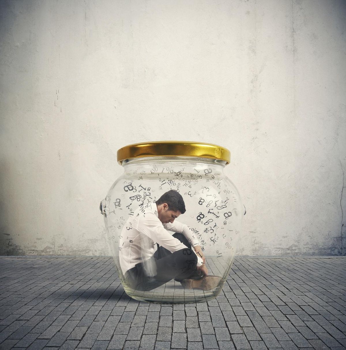 businessman in a jar