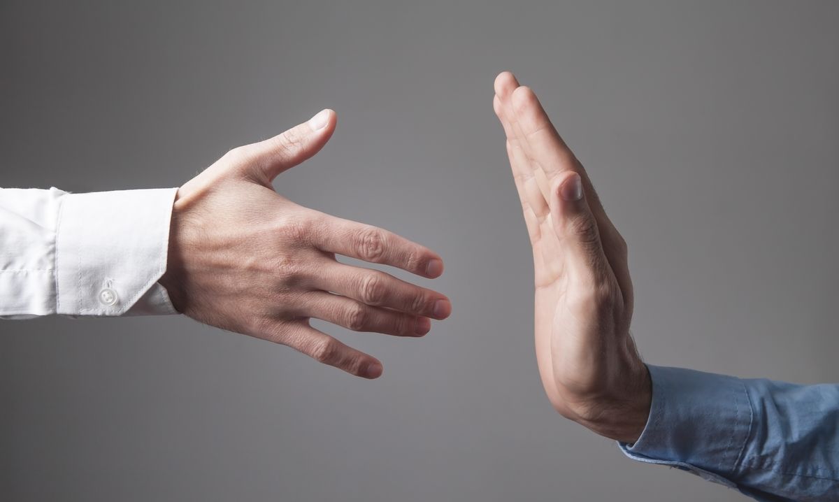 Businessman making a "no" gesture