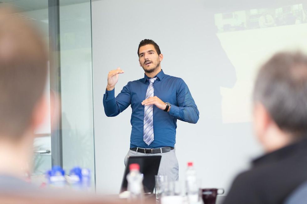 Businessman pitching to corporate venture capital arm
