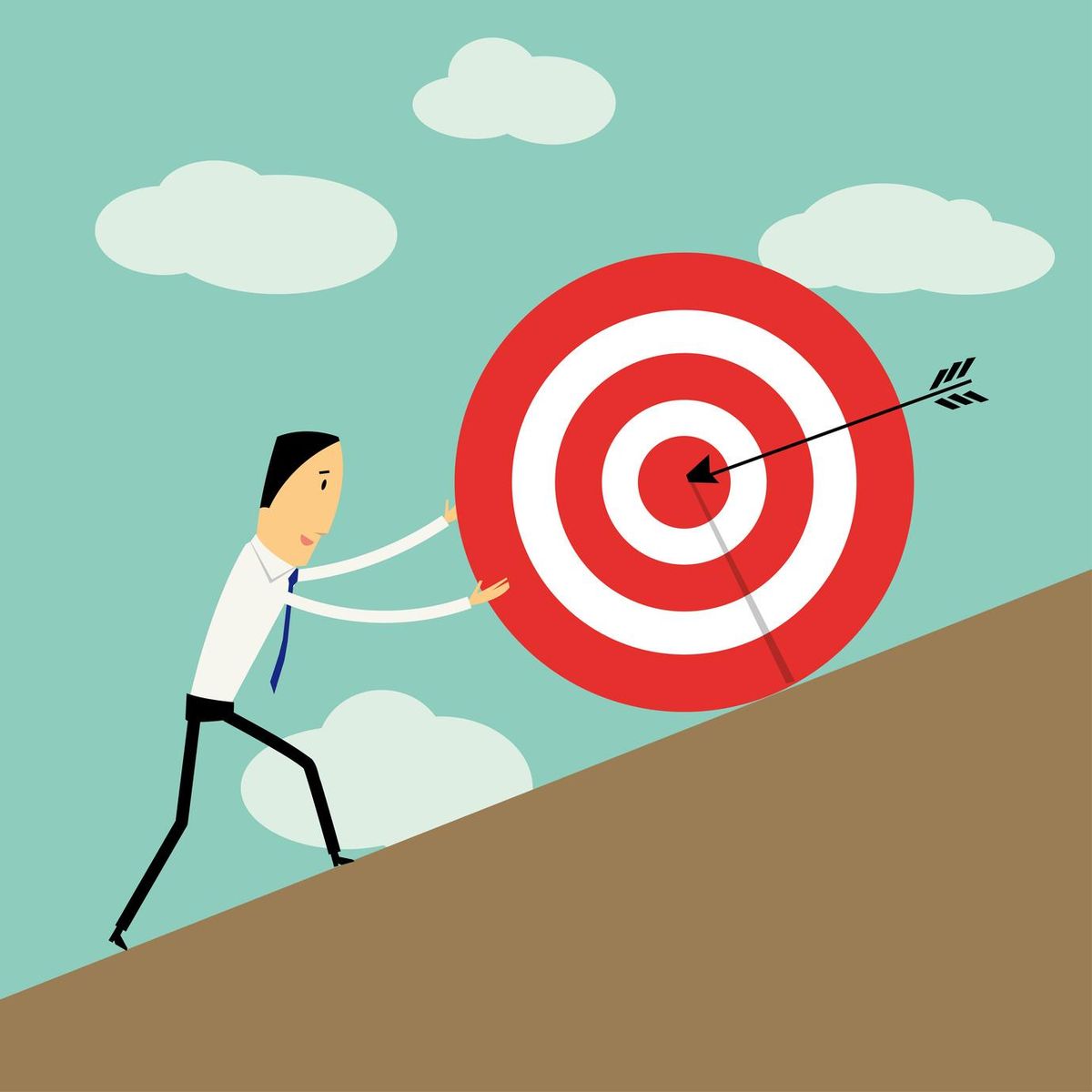 businessman pushing a target to the top