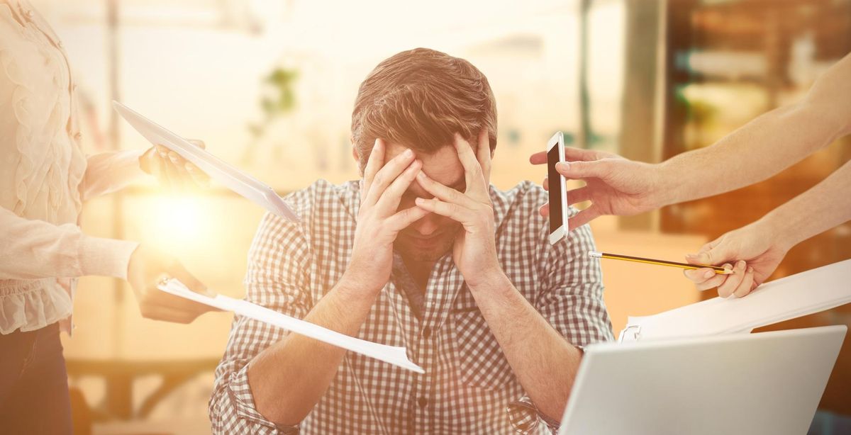 Businessman stressed out at work