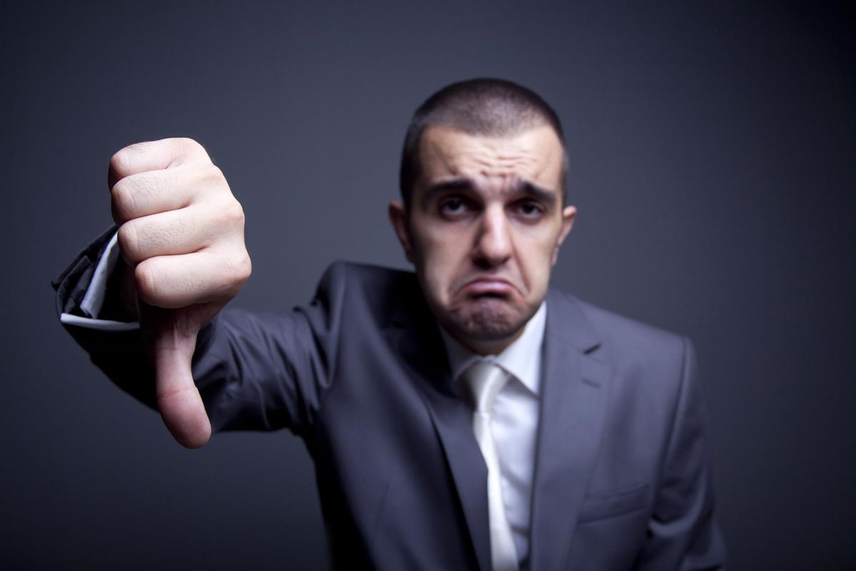 Businessman Thumbs Down