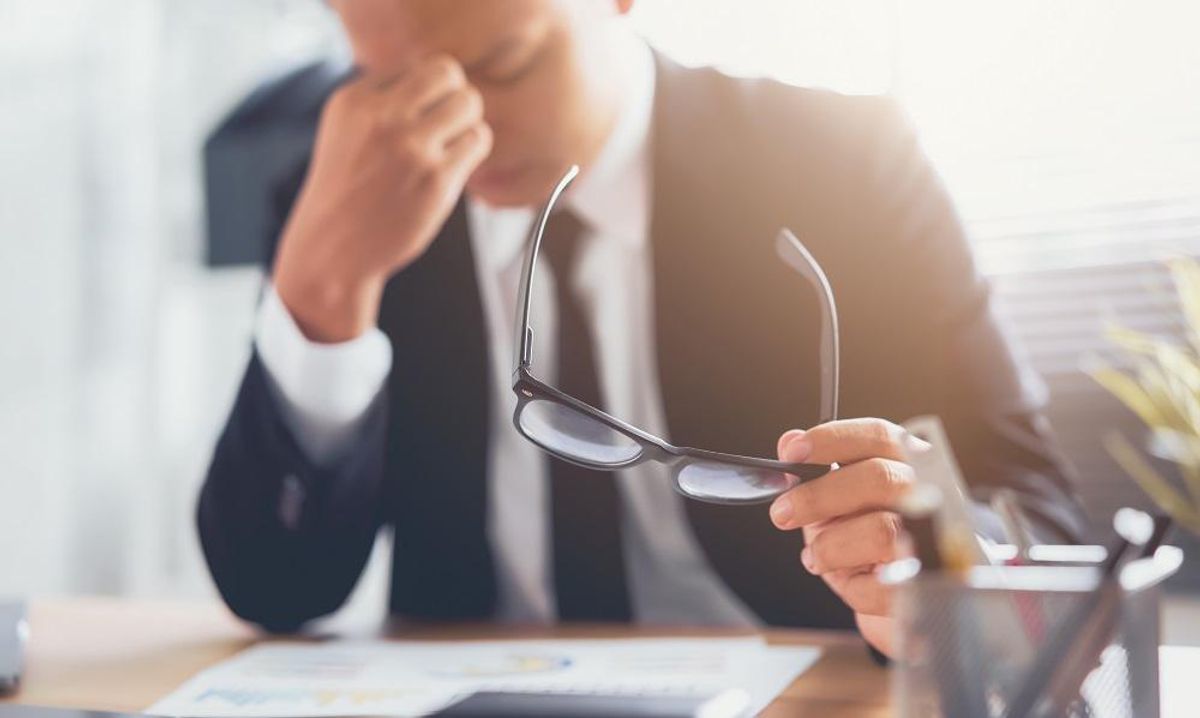 Businessman tiredness from working long hours