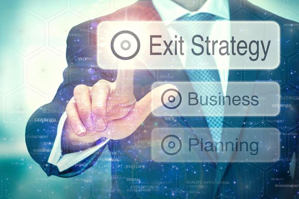 businessman with an exit strategy - Business Help and Advice Businessman Planning His Exit Strategy