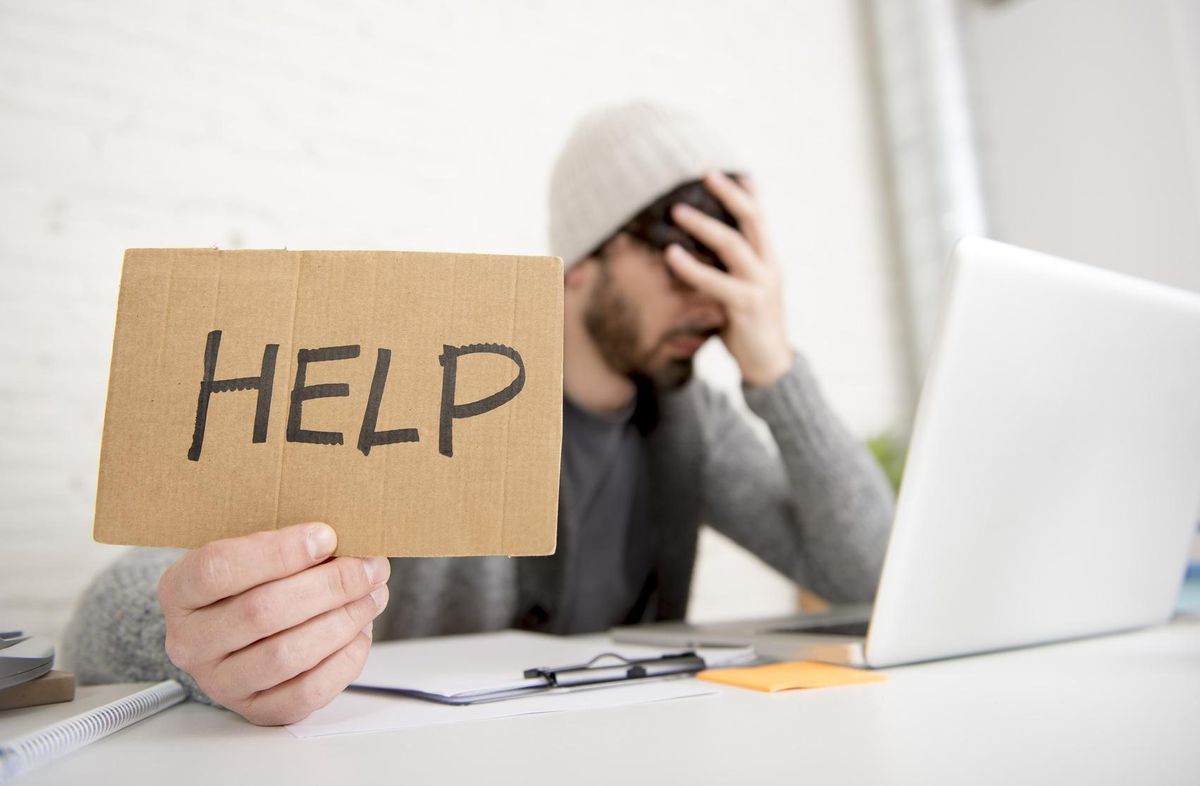 businessman working tired at computer