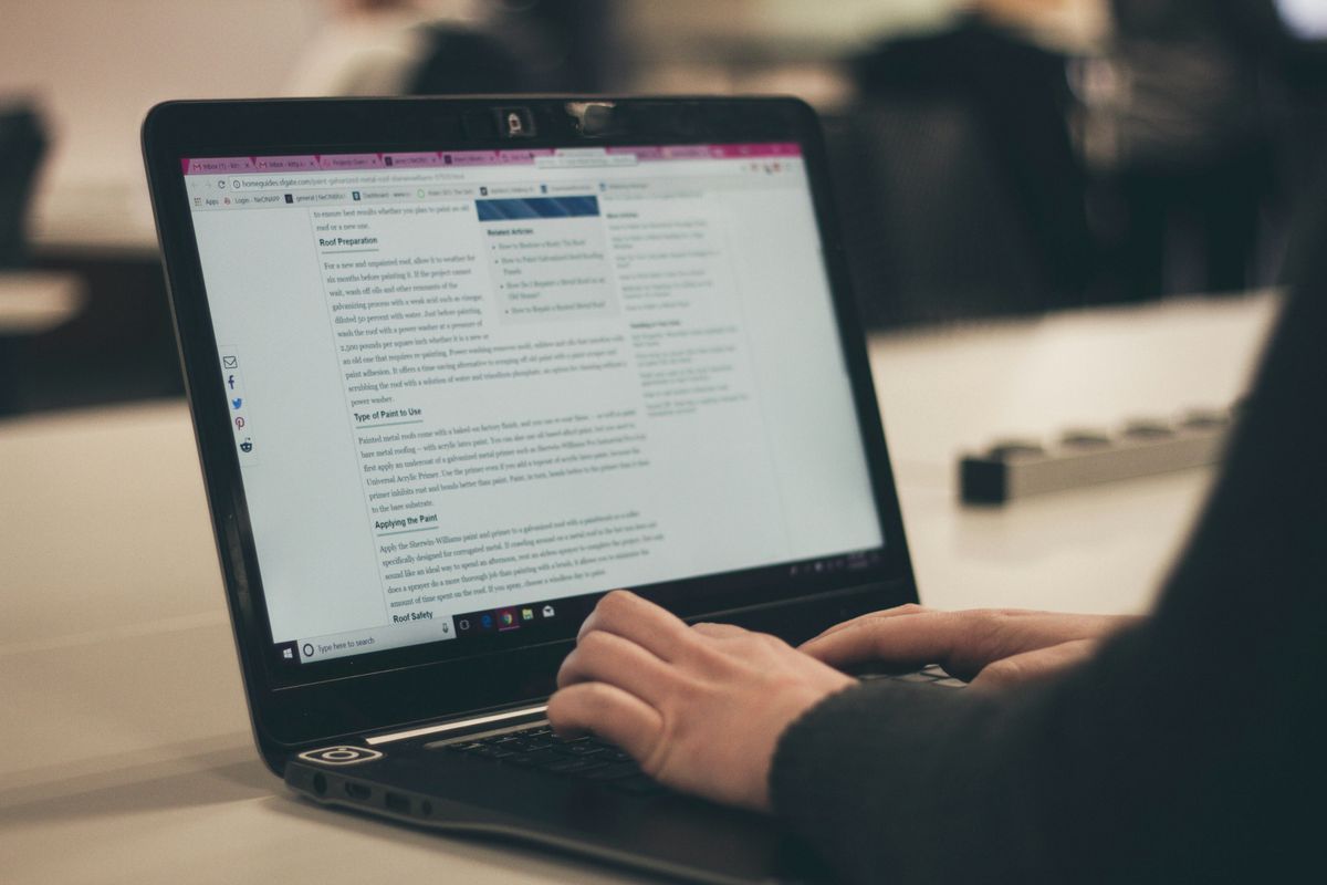 Businessman writing blog post
