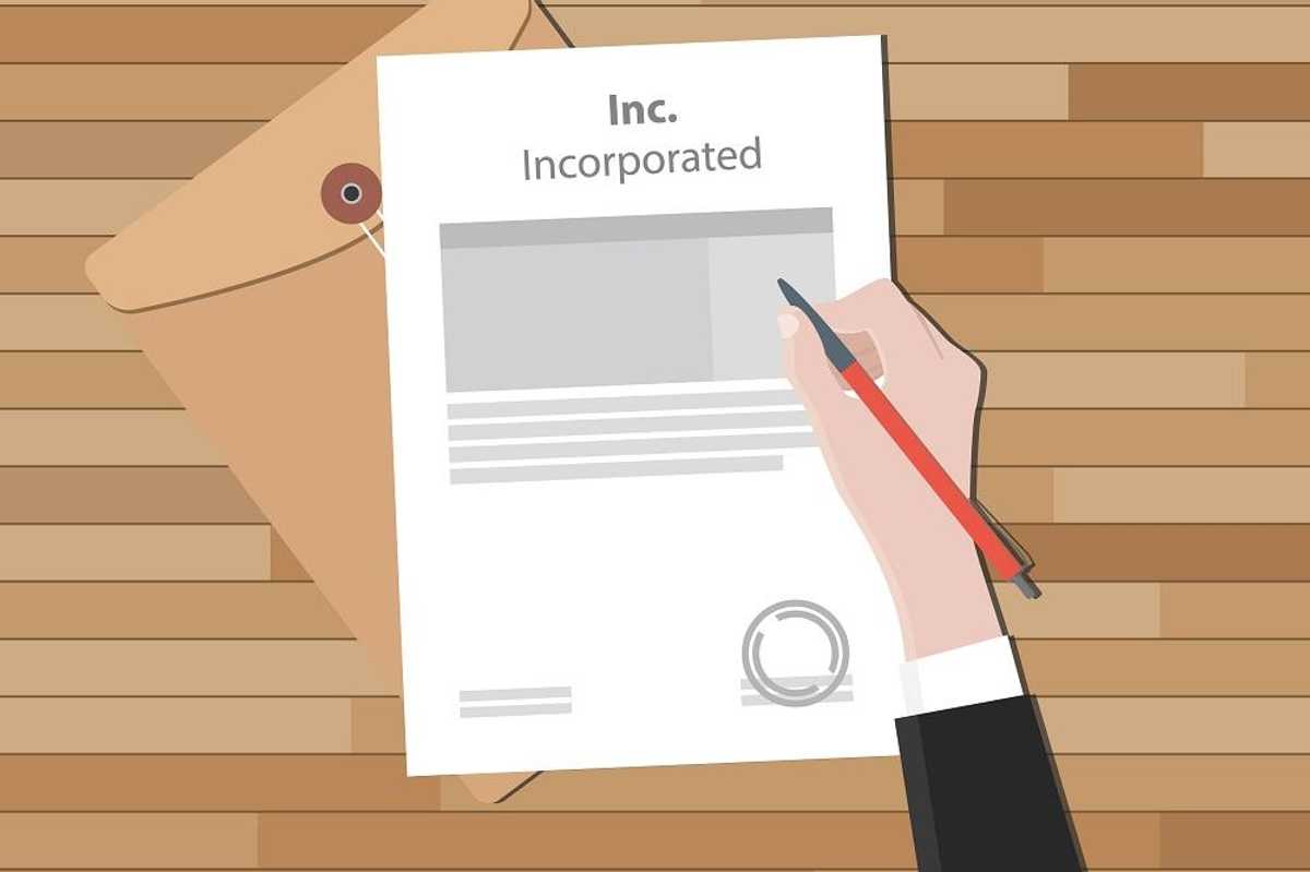 Businessperson signing papers of incorporation