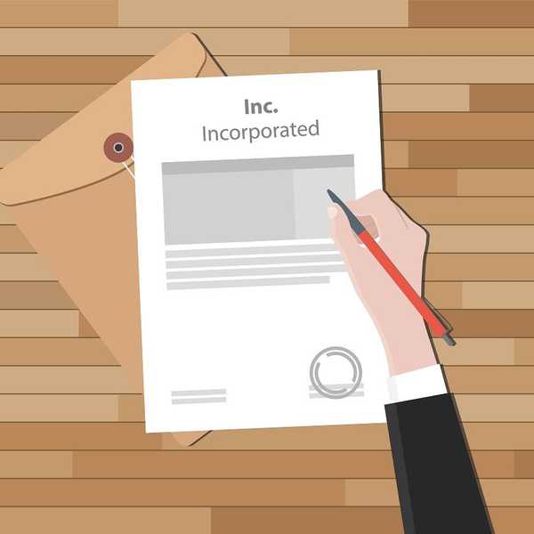Businessperson signing papers of incorporation