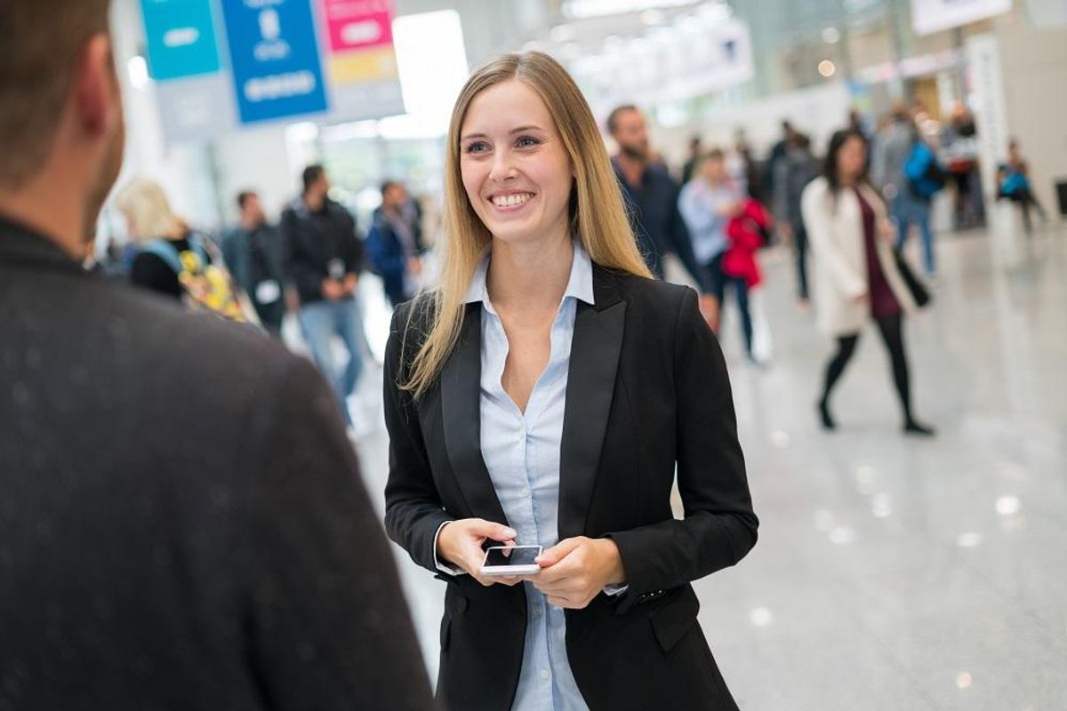 businesswoman at a trade fair