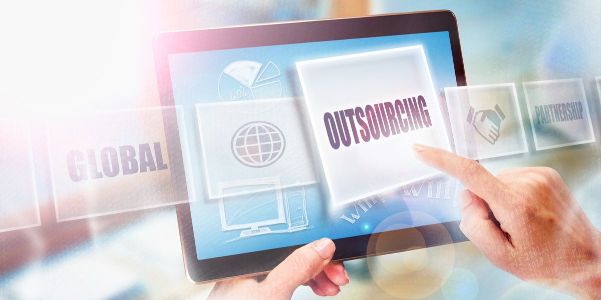 Businesswoman choosing to outsource work at her small business