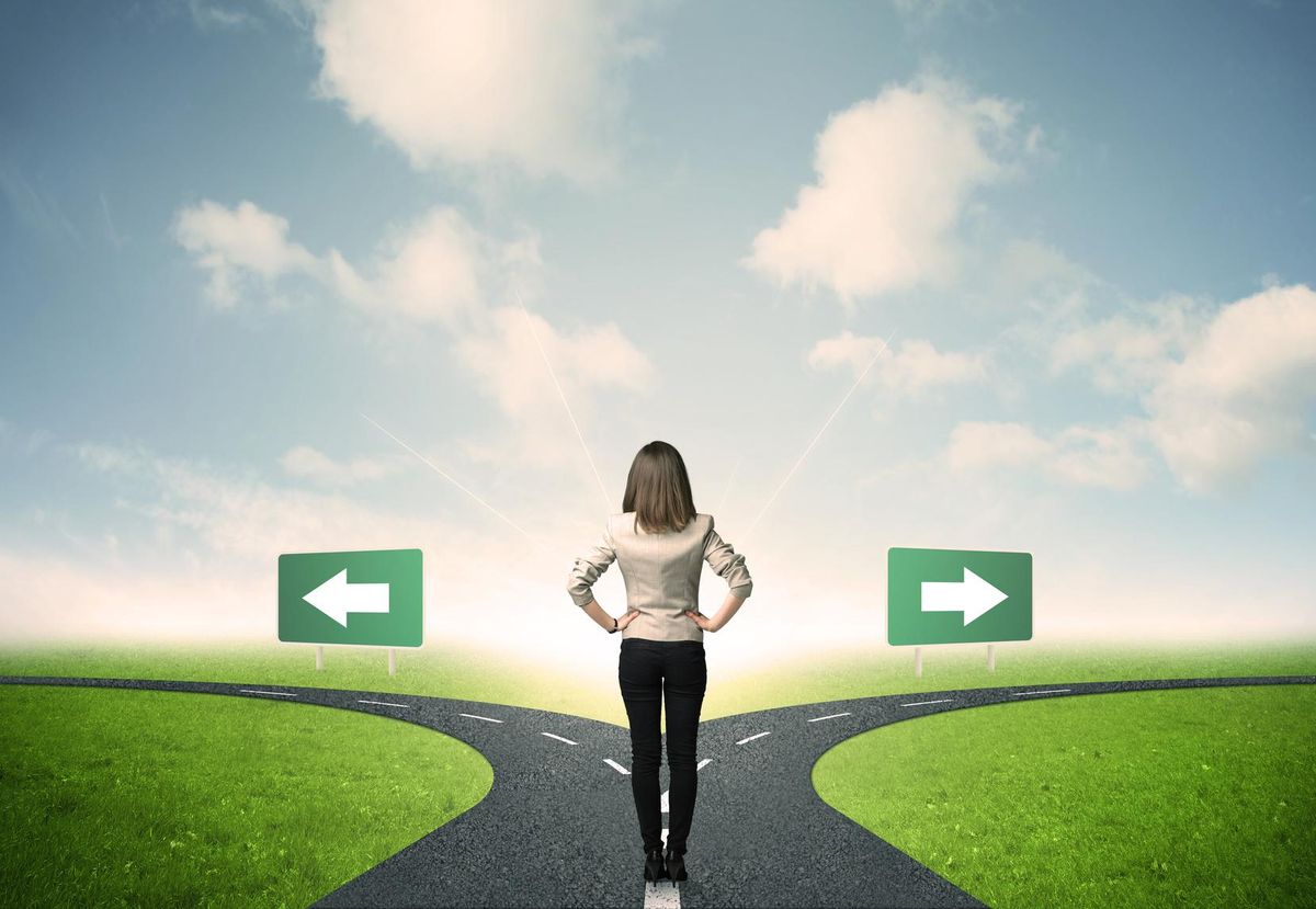 Businesswoman in front of a choice