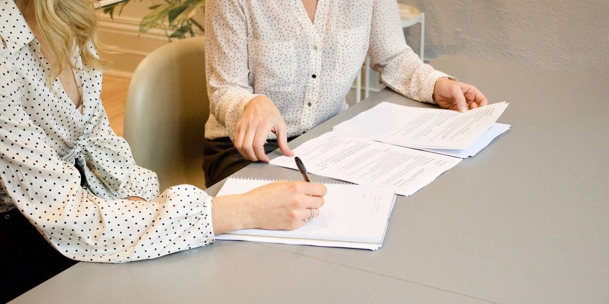 Businesswoman negotiating a contract with a client