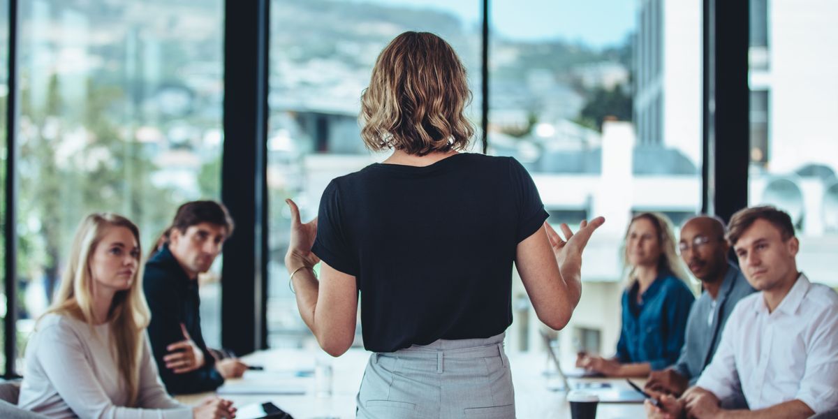 Businesswoman pitching to potential investors