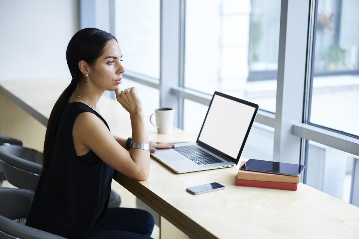 businesswoman pondering